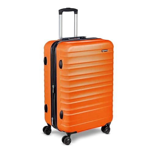 Amazon Basics Hard Shell Medium Suitcase - Expandable ABS Travel Luggage with 4 Double Spinner Wheels - Scratch Resistant and Lightweight Construction - 68 x 45.1 x 28.6cm - Burnt Orange