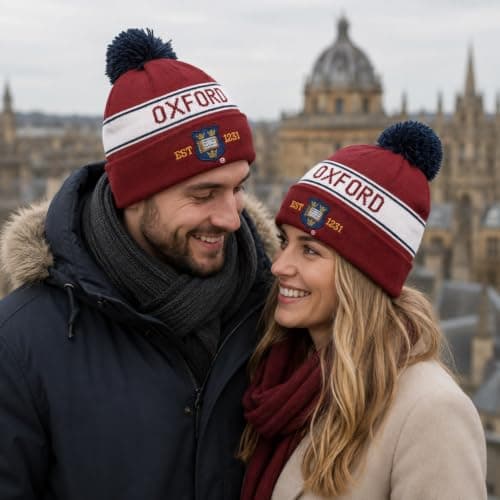 OUB102 Official Oxford University™ Pom Pom Beanie Hat Maroon | Unisex Woolly Winter Hat | Licensed Oxford Crest Embroidery | One Size Fits All — view 2