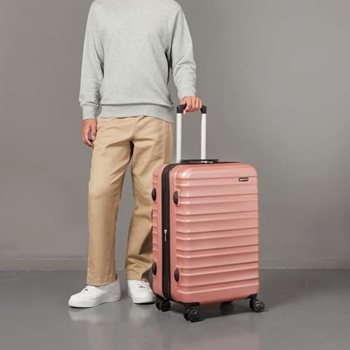 Amazon Basics Hard Shell Medium Suitcase - Expandable ABS Travel Luggage with 4 Double Spinner Wheels - Scratch Resistant and Lightweight Construction - 68 x 45.1 x 28.6cm - Rose Gold — view 5