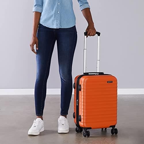 Amazon Basics Hard Shell Small Suitcase - Expandable ABS Hand Luggage with 4 Double Spinner Wheels - Scratch Resistant and Lightweight Construction - 55 x 37.5 x 25.5cm - Burnt Orange — view 6