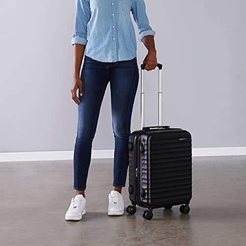 Amazon Basics Hard Shell Small Suitcase - Expandable ABS Hand Luggage with 4 Double Spinner Wheels - Scratch Resistant and Lightweight Construction - 55 x 37.5 x 25.5cm - Black — view 6
