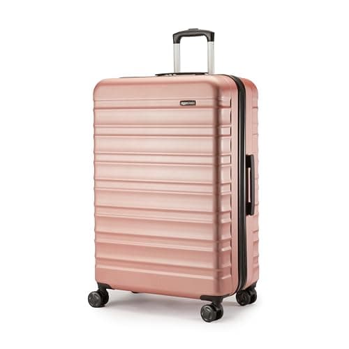 Amazon Basics Hard Shell Large Suitcase - Expandable ABS Travel Luggage with 4 Double Spinner Wheels - Scratch Resistant and Lightweight Construction - 78 x 52.6 x 32cm - Rose Gold