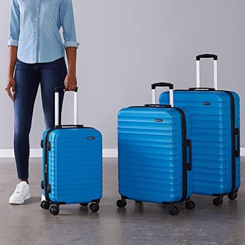 Amazon Basics Hard Shell Luggage Set (Small + Medium + Large) - Expandable ABS Travel Luggage with 4 Double Spinner Wheels - Scratch Resistant and Lightweight Construction - Light Blue — view 6