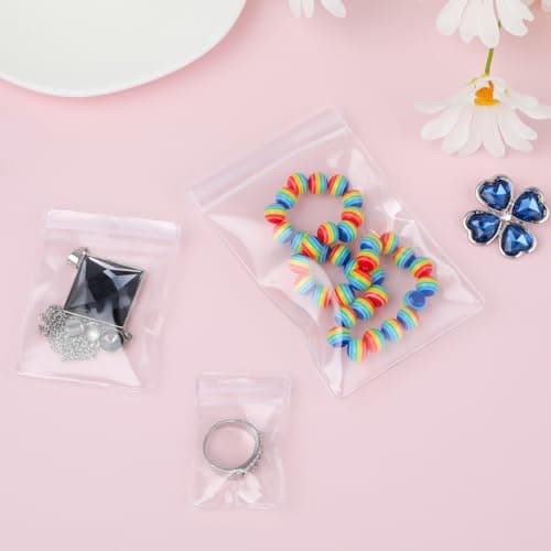 COMNICO 60PCS Jewelry Bags Clear Plastic Reclosable Thick Bags Necklace Ring Anti-Oxidation Storage Pouch for Photo Bakery Treats Travel Storage Packaging Shipping Transparent Organizer — view 6