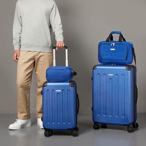 Amazon Basics Hardside Spinner Luggage Set, 4-Piece, Large Suitcase, Carry-On Suitcase, Tote Bag, Compact Travel Bag, Expandable, 4 Spinner Wheels, Navy Blue — view 5