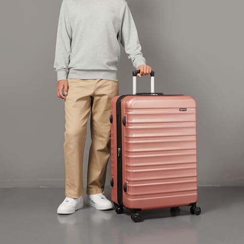 Amazon Basics Hard Shell Large Suitcase - Expandable ABS Travel Luggage with 4 Double Spinner Wheels - Scratch Resistant and Lightweight Construction - 78 x 52.6 x 32cm - Rose Gold — view 5