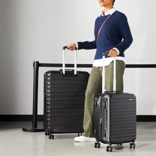 Amazon Basics Hard Shell Luggage Set (Small + Large) - Expandable ABS Travel Luggage with 4 Double Spinner Wheels - Scratch Resistant and Lightweight Construction - Black — view 6
