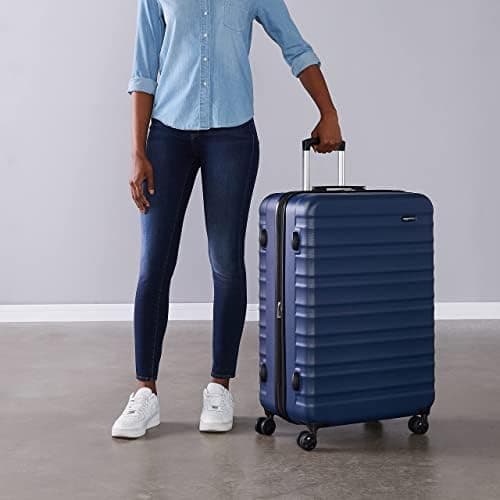 Amazon Basics Hard Shell Large Suitcase - Expandable ABS Travel Luggage with 4 Double Spinner Wheels - Scratch Resistant and Lightweight Construction - 78 x 52.6 x 32cm - Navy Blue — view 6