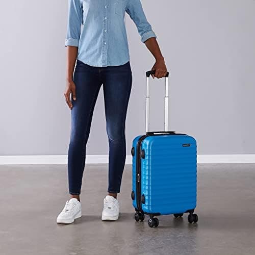 Amazon Basics Hard Shell Small Suitcase - Expandable ABS Hand Luggage with 4 Double Spinner Wheels - Scratch Resistant and Lightweight Construction - 55 x 37.5 x 25.5cm - Light Blue — view 6