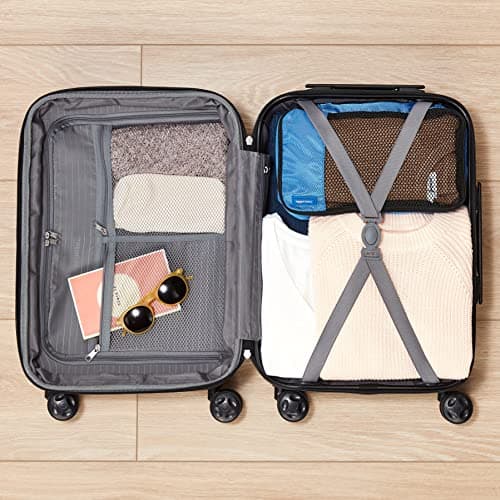 Amazon Basics Hard Shell Medium Suitcase - Expandable ABS Travel Luggage with 4 Double Spinner Wheels - Scratch Resistant and Lightweight Construction - 68 x 45.1 x 28.6cm - Light Blue — view 3