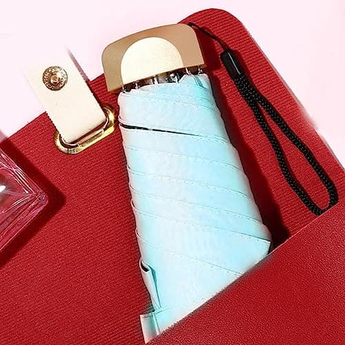 RiToEasysports Mini Foldable Umbrella with UV Protection and Wind Proof Features Ideal for Travel and Daily Use Alloy Impact Cloth (Sky Blue) — view 4