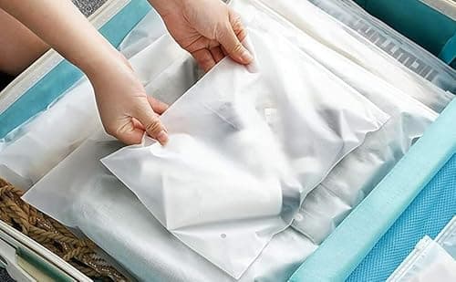 Ziplock Bags Clear for Travel | Pack of 50 Large Waterproof Pouches – Resealable Space Saver Bags for Clothes, Luggage & Towels (18X20 cm, Clear) — view 3