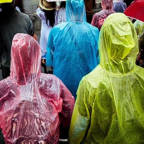 MUNSKT 12 Pack Disposable Rain Ponchos for Adults & Kids, Waterproof Clear Plastic Poncho with Hood, Lightweight Emergency Ponchos for Family Travel, Hiking, Festivals — view 3