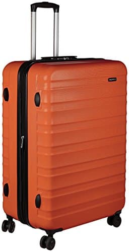 Amazon Basics Hard Shell Large Suitcase - Expandable ABS Travel Luggage with 4 Double Spinner Wheels - Scratch Resistant and Lightweight Construction - 78 x 52.6 x 32cm - Burnt Orange